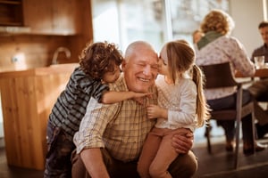 grandparent playing with grandchildren